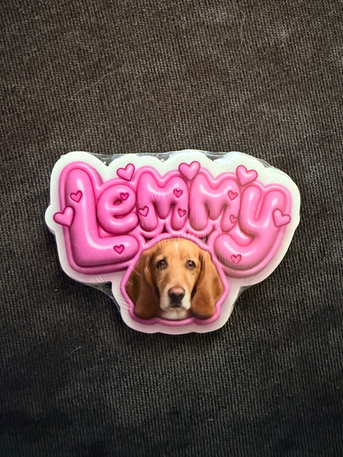 Sticker with Lemmy face on a dark textured background